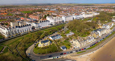an aerial view of Filey, with the sea-facing houses and beach visible