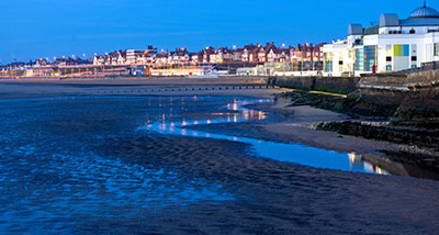 a view of Bridlington's south bay and promenade at twilight